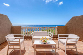 Seaside Apartment with Spacious Terrace, Pool, and Wi-Fi